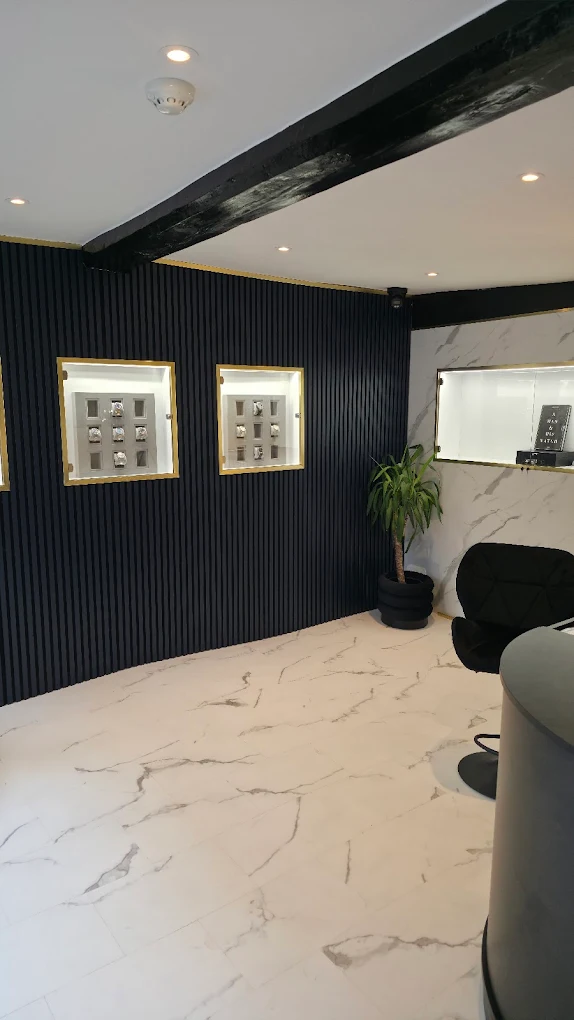 Made For Time watch display cabinets with gold trim